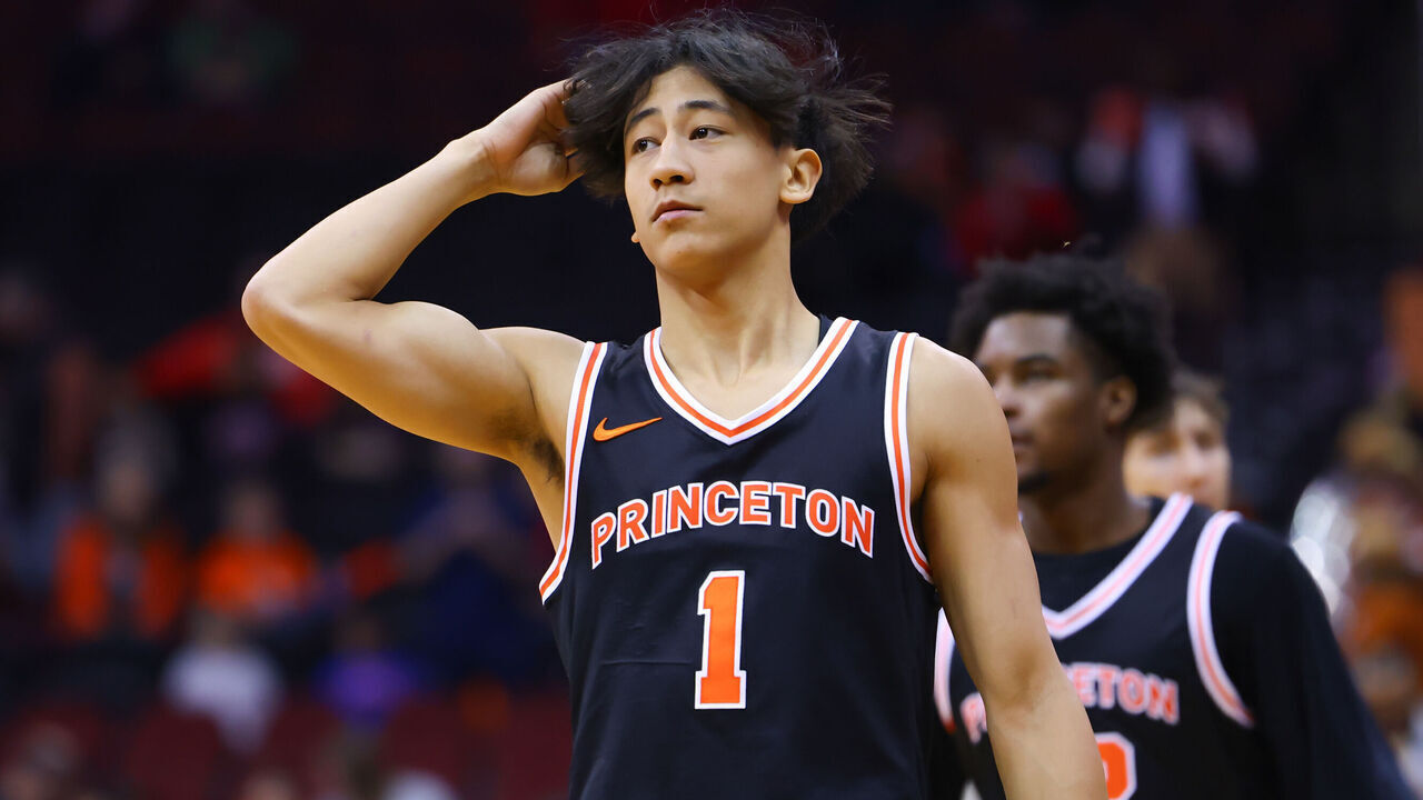 NEWARK, NJ - DECEMBER 21: Xaivian Lee #1 of the Princeton Tigers warms up prior to the Never Forget Tribute Classic game against the Rutgers Scarlet Knights on December 21, 2024 at the Prudential Center in Newark, New Jersey.