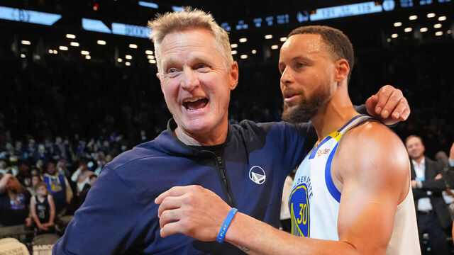 BROOKLYN, NY - MARCH 6: Head Coach Steve Kerr of the Golden State Warriors embraces Stephen Curry #30 of the Golden State Warriors after the game against the Brooklyn Nets on March 6, 2025 at Barclays Center in Brooklyn, New York. Mandatory Copyright Notice: Copyright 2025 NBAE
