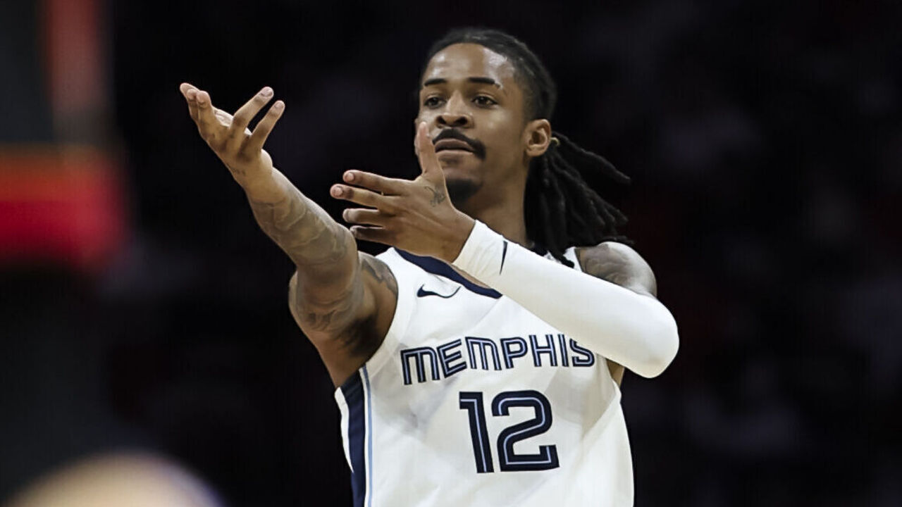 MIAMI, FLORIDA - APRIL 03: Ja Morant #12 of the Memphis Grizzlies reacts during the 4th quarter against the Miami Heat at Kaseya Center on April 03, 2025 in Miami, Florida.