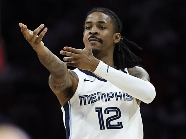 MIAMI, FLORIDA - APRIL 03: Ja Morant #12 of the Memphis Grizzlies reacts during the 4th quarter against the Miami Heat at Kaseya Center on April 03, 2025 in Miami, Florida.
