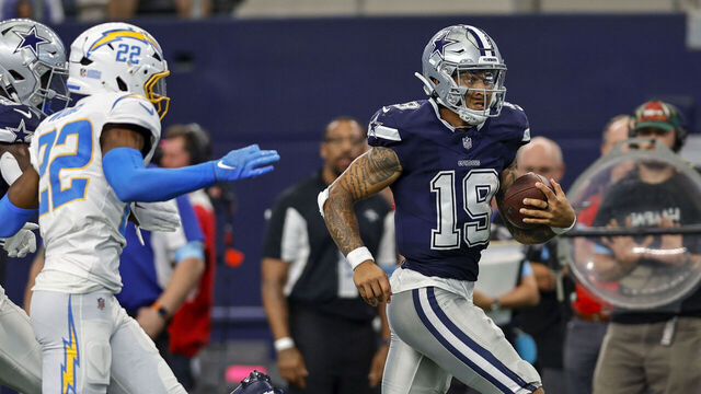 ARLINGTON, TX - AUGUST 24: Dallas Cowboys quarterback Trey Lance (19) runs for a touchdown during the game between the Dallas Cowboys and the Los Angeles Chargers on August 24, 2024 at AT&T Stadium in Arlington, Texas.