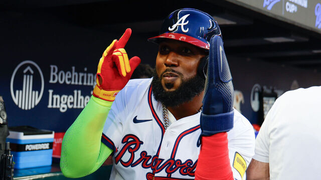 ATLANTA, GA - APRIL 04: Marcell Ozuna #20 of the Atlanta Braves celebrates in the dugout after scoring in the third inning during the game between the Miami Marlins and the Atlanta Braves at Truist Park on Friday, April 4, 2025 in Atlanta, Georgia.