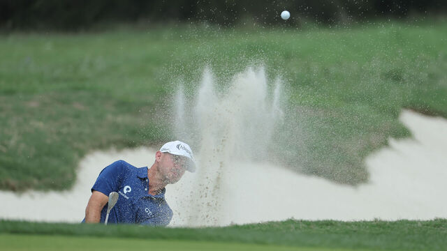 SAN ANTONIO, TEXAS - APRIL 04: Brian Harman of the United States plays a shot from a bunker on the 14th hole during the second round of the Valero Texas Open 2025 at TPC San Antonio on April 04, 2025 in San Antonio, Texas.