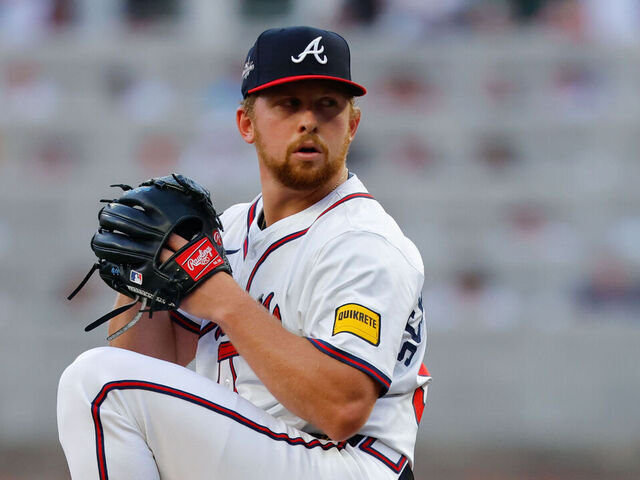 ATLANTA, GA - APRIL 04: Spencer Schwellenbach #56 of the Atlanta Braves pitches during the game between the Miami Marlins and the Atlanta Braves at Truist Park on Friday, April 4, 2025 in Atlanta, Georgia.
