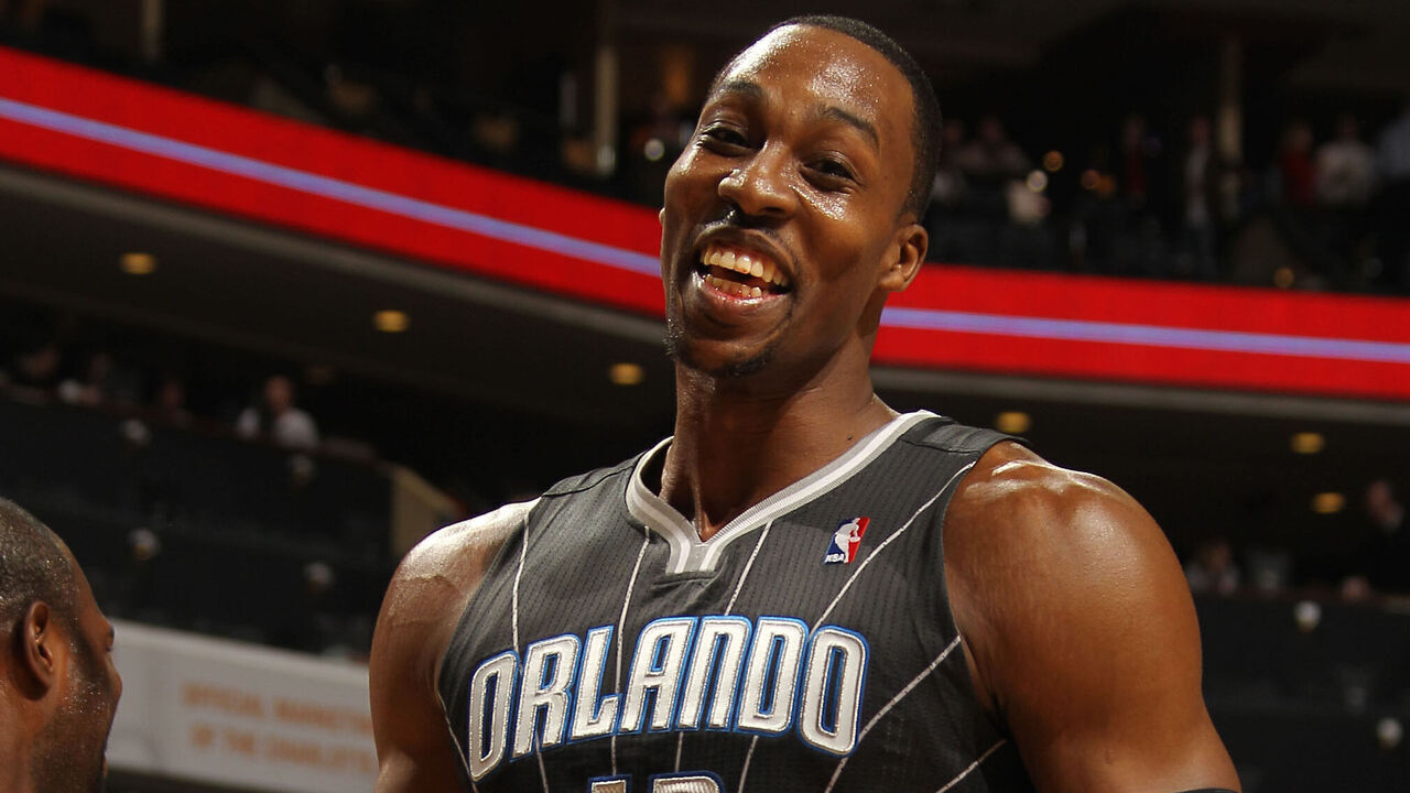 CHARLOTTE, NC - MARCH 6: Dwight Howard #12 of the Orlando Magic looks on during the game against the Charlotte Bobcats at the Time Warner Cable Arena on March 6, 2012 in Charlotte, North Carolina. Mandatory Copyright Notice: Copyright 2012 NBAE