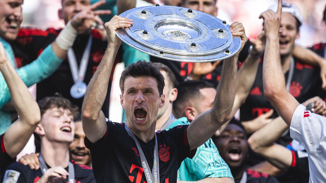 COLOGNE, GERMANY - MAY 27: Thomas Mueller of Muenchen celebrates the winning of the championship at the ceremony after the Bundesliga match between 1.FC Koeln and FC Bayern Muenchen at RheinEnergieStadion on May 27, 2023 in Cologne, Germany.