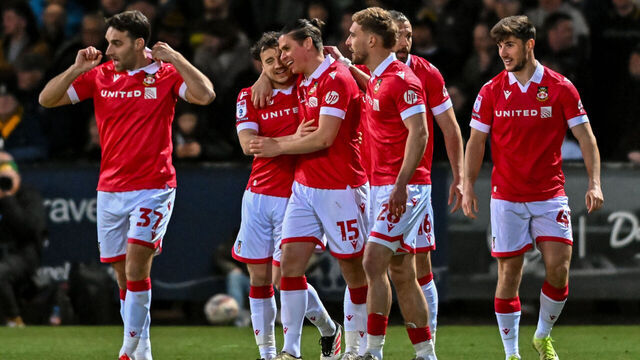 George Dobson, 15, from Wrexham, celebrates after scoring the team's first goal during the Sky Bet League 1 match between Cambridge United and Wrexham at the Cledara Abbey Stadium in Cambridge, United Kingdom, on April 1, 2025.