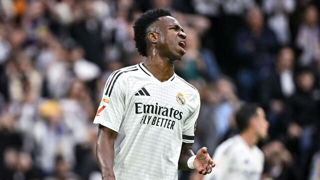Real Madrid's Brazilian forward #07 Vinicius Junior reacts after failing to score from a penalty kick during the Spanish league football match between Real Madrid CF and Valencia CF at the Santiago Bernabeu stadium in Madrid on April 5, 2025.