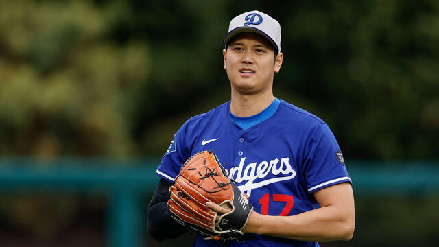 PHILADELPHIA, PENNSYLVANIA - APRIL 5: Shohei Ohtani #17 of the Los Angeles Dodgers warms up in the outfield prior to a game against the Philadelphia Phillies at Citizens Bank Park on April 5, 2025 in Philadelphia, Pennsylvania.