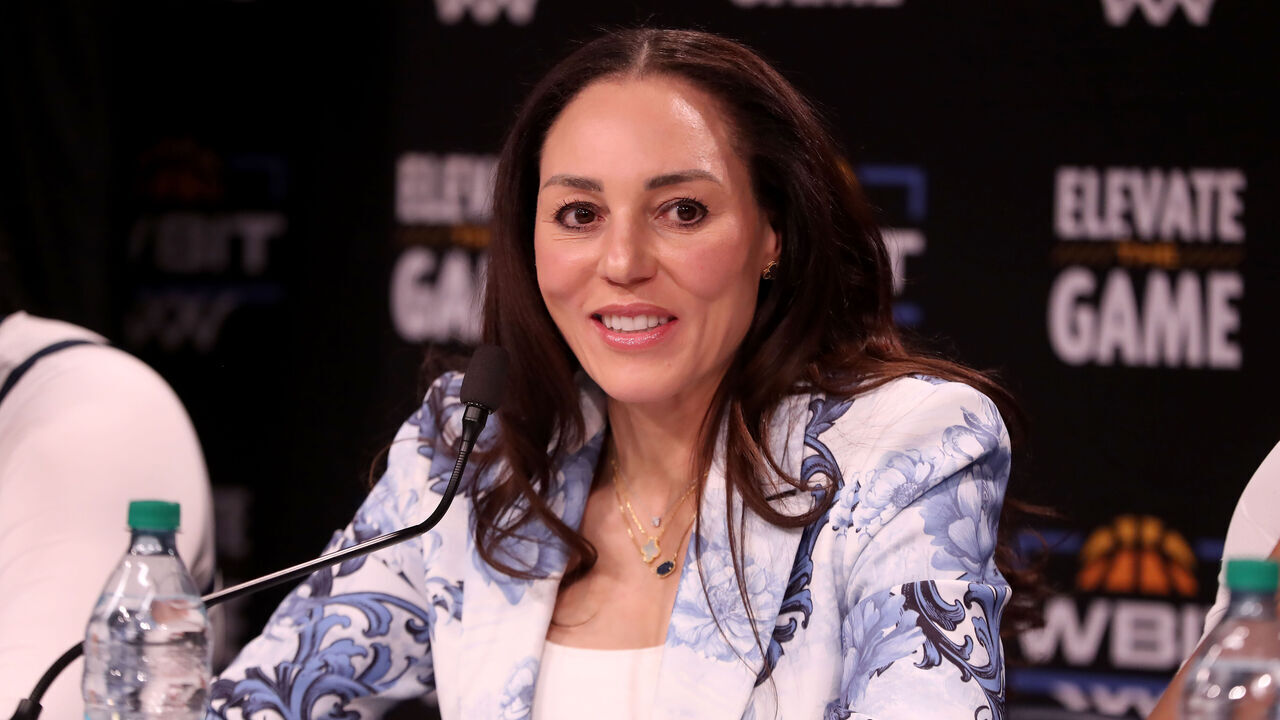 TUCSON, AZ - March 20: Arizona Wildcats head coach Adia Barnes speaks the press after losing a WBIT game to the Northern Arizona Lumberjacks 69-71 on March 20, 2025, at McKale Center in Tucson, AZ.