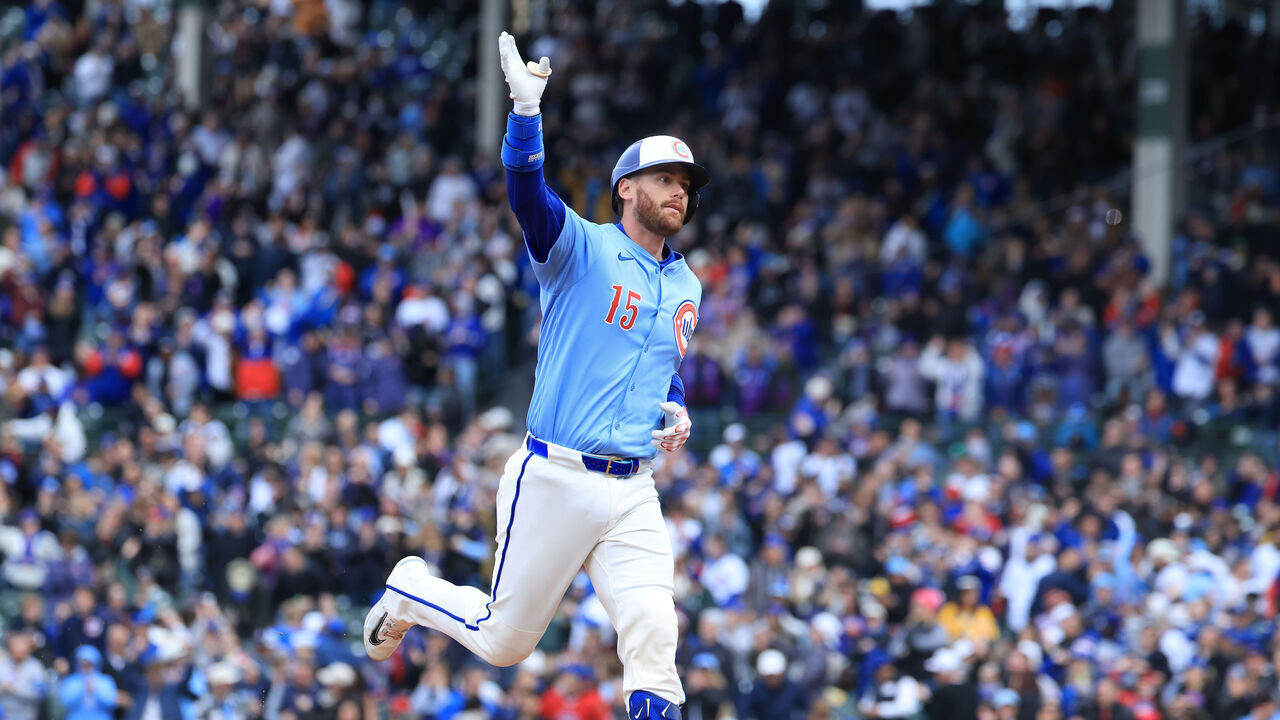 CHICAGO, ILLINOIS - APRIL 05: Carson Kelly #15 of the Chicago Cubs celebrates a three run home run during the sixth inning against the San Diego Padres at Wrigley Field on April 05, 2025 in Chicago, Illinois.