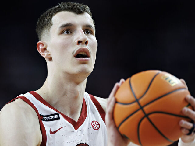 FAYETTEVILLE, ARKANSAS - FEBRUARY 22: Zvonimir Ivisic #44 of the Arkansas Razorbacks shoots a free throw during a game against the Missouri Tigers at Bud Walton Arena on February 22, 2025 in Fayetteville, Arkansas. The Razorbacks defeated the Tigers 92-85.