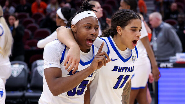 CLEVELAND, OH - MARCH 12: Buffalo Bulls guard Chellia Watson (35) and Buffalo Bulls guard Mallory Daly (2) celebrates following the MAC Women's Basketball Tournament Quarterfinal game between the Bowling Green Falcons and Buffalo Bulls on March 12, 2025, at Rocket Arena in Cleveland, OH.