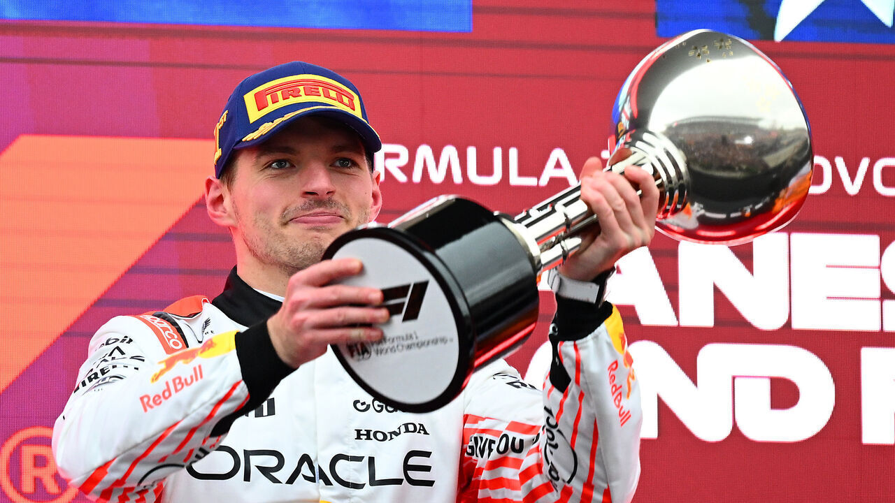 SUZUKA, JAPAN - APRIL 06: Race winner Max Verstappen of the Netherlands and Oracle Red Bull Racing lifts his trophy on the podium during the F1 Grand Prix of Japan at Suzuka Circuit on April 06, 2025 in Suzuka, Japan.