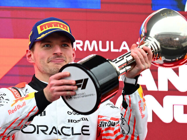 SUZUKA, JAPAN - APRIL 06: Race winner Max Verstappen of the Netherlands and Oracle Red Bull Racing lifts his trophy on the podium during the F1 Grand Prix of Japan at Suzuka Circuit on April 06, 2025 in Suzuka, Japan.