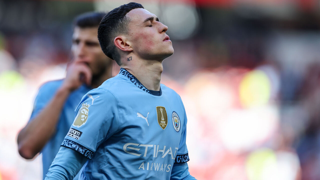 MANCHESTER, ENGLAND - APRIL 6: Manchester City's Phil Foden reacts during the Premier League match between Manchester United FC and Manchester City FC at Old Trafford on April 6, 2025 in Manchester, England.