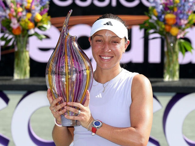CHARLESTON, SOUTH CAROLINA - APRIL 06: Jessica Pegula of United States poses with the trophy after defeating Sofia Kenin of United States during the final of the Credit One Charleston Open at Credit One Stadium on April 06, 2025 in Charleston, South Carolina.