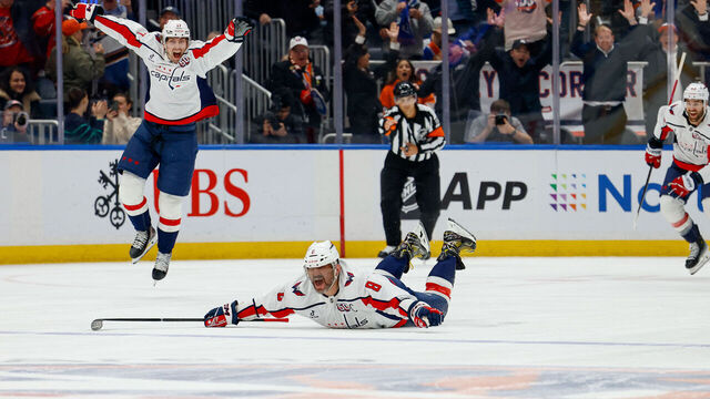 ELMONT, NY - APRIL 6: Alex Ovechkin #8 of the Washington Capitals celebrates as he scores his 895th career NHL goal, breaking the record of 894 goals set by Wayne Gretzky during a game against the New York Islanders at UBS Arena on April 6, 2022 in Elmont, N.Y.
