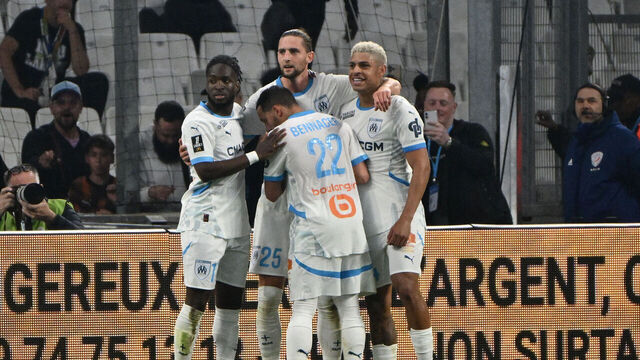 Marseille's French midfielder #25 Adrien Rabiot celebrates after scoring the third goal with teamates during their ligue 1 football match Olympique de Marseille (OM) vs Toulouse FC at the Velodrome stadium in Marseille on 06 April, 2025.