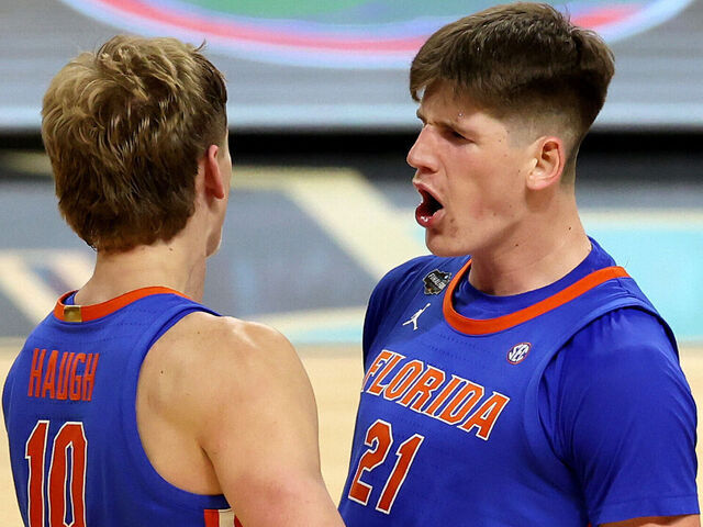 SAN ANTONIO, TEXAS - APRIL 05: Thomas Haugh #10 and Alex Condon #21 of the Florida Gators reacts during the second half in the Final Four game of the NCAA Men's Basketball Tournament against the Auburn Tigers at the Alamodome on April 05, 2025 in San Antonio, Texas.