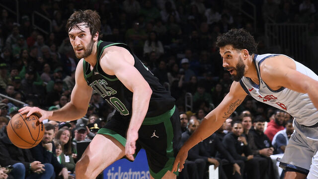 BOSTON, MA - APRIL 6: Luke Kornet #40 of the Boston Celtics dribbles the ball during the game against the Washington Wizards on April 6, 2025 at TD Garden in Boston, Massachusetts. NOTE TO USER: User expressly acknowledges and agrees that, by downloading and/or using this Photograph, user is consenting to the terms and conditions of the Getty Images License Agreement. Mandatory Copyright Notice: Copyright 2025 NBAE