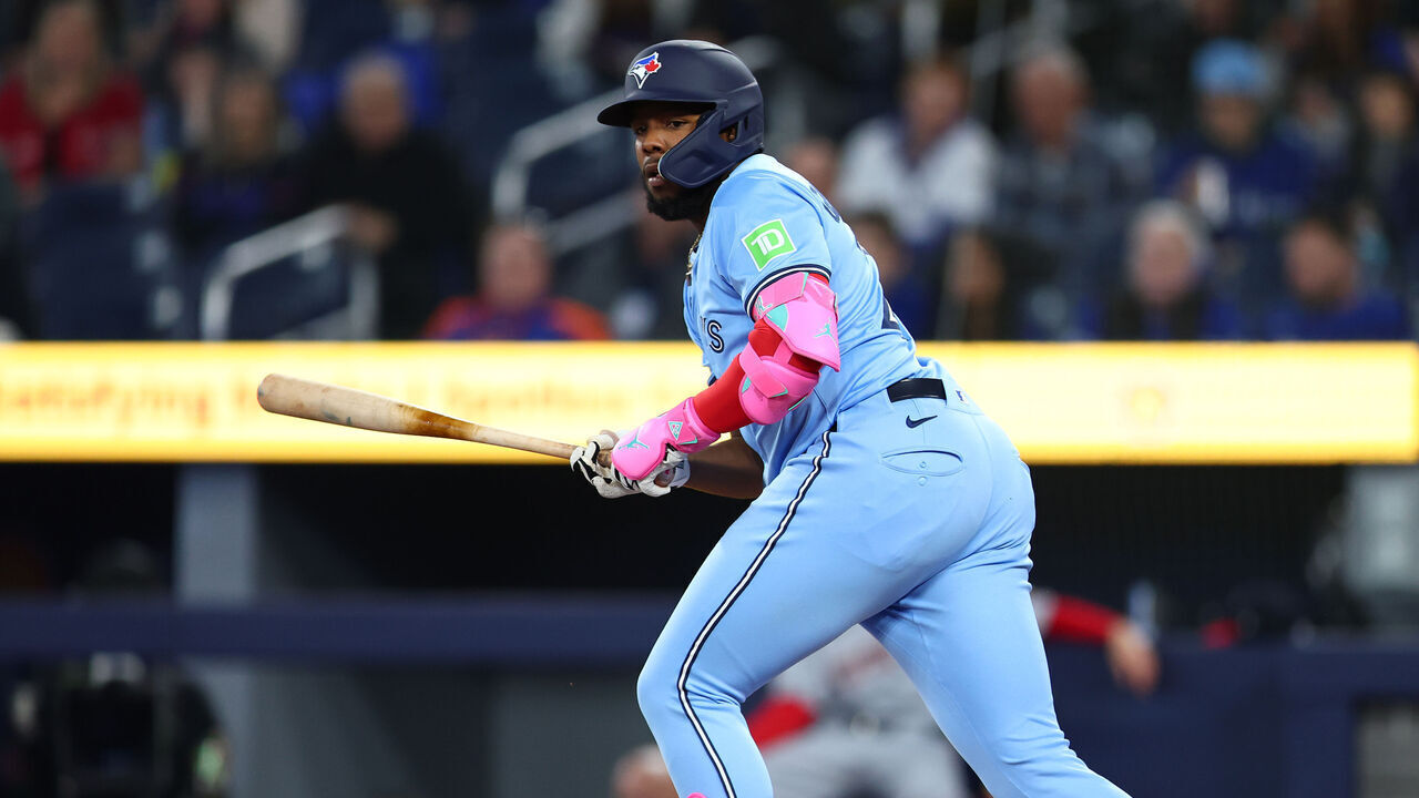 TORONTO, ON - APRIL 02: Vladimir Guerrero Jr. #27 of the Toronto Blue Jays bats in the first inning during a game against the Washington Nationals at Rogers Centre on April 02, 2025 in Toronto, Ontario, Canada.