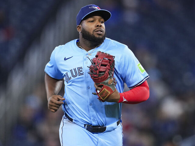 TORONTO, ON - MARCH 31: Vladimir Guerrero Jr. #27 of Toronto Blue Jays jogs off the field in the middle of the first inning against the Washington Nationals in their MLB game at the Rogers Centre on March 31, 2025 in Toronto, Ontario, Canada.