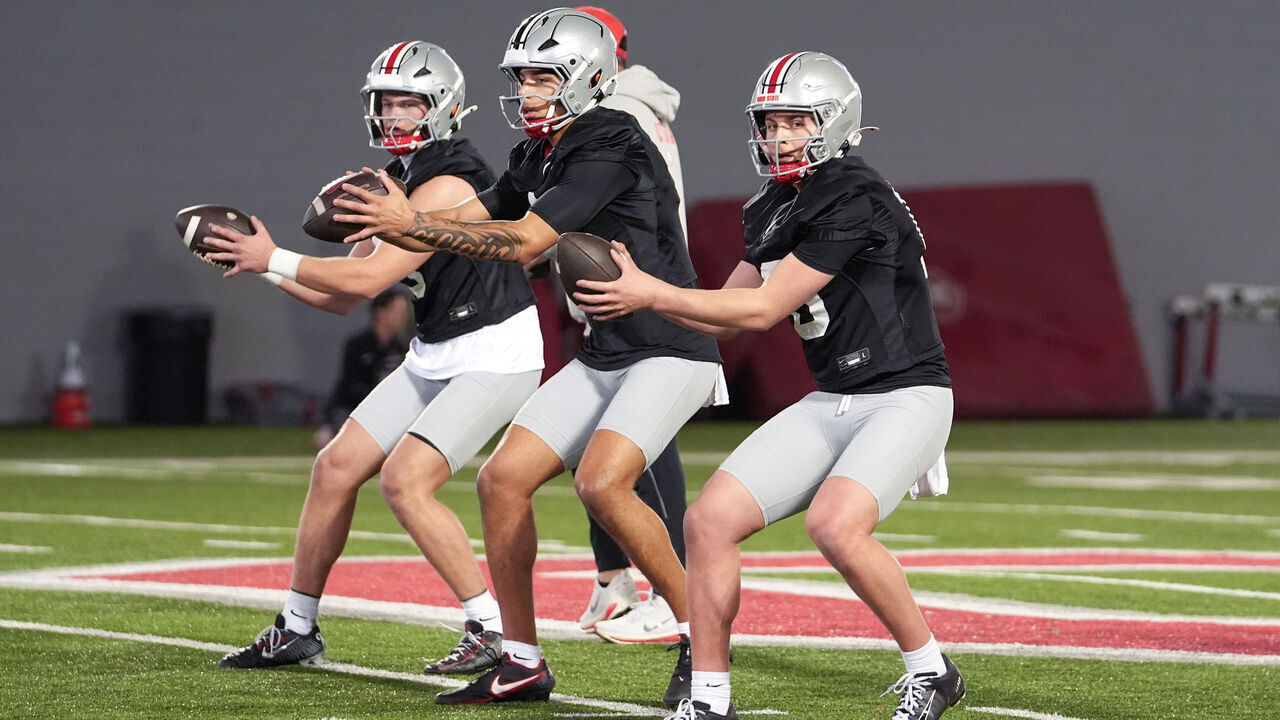 COLUMBUS, OHIO - MARCH 19: (Right to Left) Julian Sayin #10, Tavien St. Clair #9 and Lincoln Kienholz #3 of the Ohio State Buckeyes drop back to pass the ball during spring practice at Woody Hayes Athletic Center on March 19, 2025 in Columbus, Ohio.