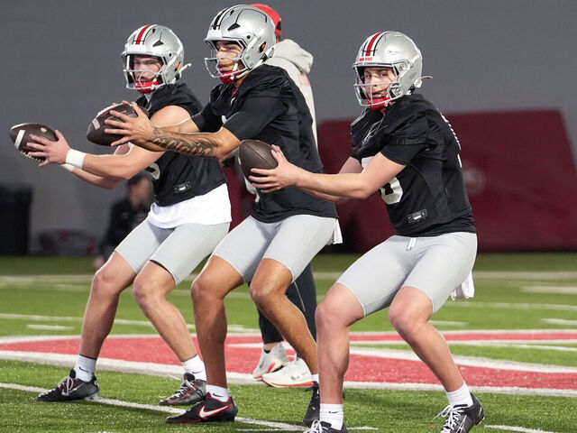 COLUMBUS, OHIO - MARCH 19: (Right to Left) Julian Sayin #10, Tavien St. Clair #9 and Lincoln Kienholz #3 of the Ohio State Buckeyes drop back to pass the ball during spring practice at Woody Hayes Athletic Center on March 19, 2025 in Columbus, Ohio.