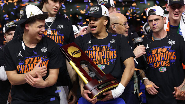 SAN ANTONIO, TEXAS - APRIL 07: Alijah Martin #15 of the Florida Gators celebrates with the trophy after defeating the Houston Cougars in the National Championship of the NCAA Men's Basketball Tournament at the Alamodome on April 07, 2025 in San Antonio, Texas.