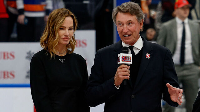 ELMONT, NY - APRIL 6: Former NHL player Wayne Gretzky speaks during the celebration after Alex Ovechkin #8 of the Washington Capitals scores his 895th career goal during the second period against the New York Islanders at UBS Arena on April 06, 2025 in Elmont, New York. Ovechkin's goal passes Gretzky's 894 goals to become the NHL all-time goal-scoring leader