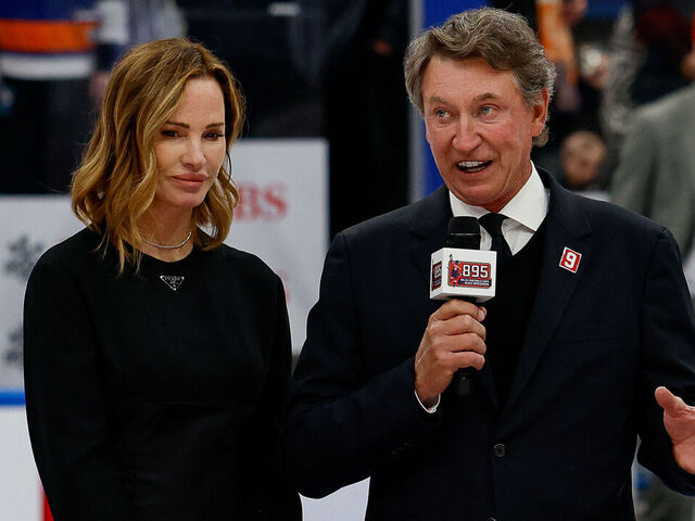 ELMONT, NY - APRIL 6: Former NHL player Wayne Gretzky speaks during the celebration after Alex Ovechkin #8 of the Washington Capitals scores his 895th career goal during the second period against the New York Islanders at UBS Arena on April 06, 2025 in Elmont, New York. Ovechkin's goal passes Gretzky's 894 goals to become the NHL all-time goal-scoring leader