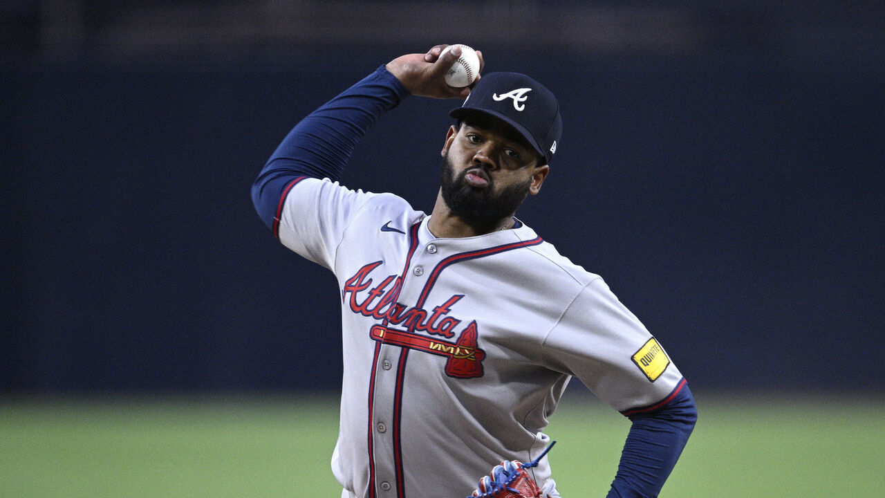 SAN DIEGO, CALIFORNIA - MARCH 28: Reynaldo Lopez #40 of the Atlanta Braves throws a pitch against the San Diego Padres during the first inning at Petco Park on March 28, 2025 in San Diego, California.