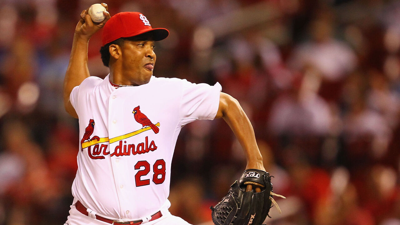 ST. LOUIS, MO - AUGUST 9: Reliever Octavio Dotel #28 of the St. Louis Cardinals pitches against the Milwaukee Brewers at Busch Stadium on August 9, 2011 in St. Louis, Missouri. The Brewers beat the Cardinals 5-3 in 10 innings.