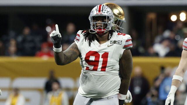 ATLANTA, GA - JANUARY 20: Ohio State Buckeyes defensive tackle Tyleik Williams (91) celebrates after a sack of Notre Dame Fighting Irish quarterback Riley Leonard (13) during the Ohio State Buckeyes versus Notre Dame Fighting Irish College Football Playoff National Championship game on January 20, 2025, at Mercedes-Benz Stadium in Atlanta, GA.