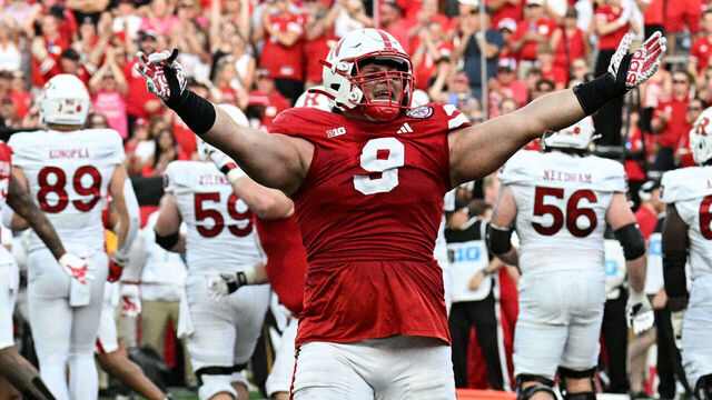 LINCOLN, NEBRASKA - OCTOBER 5: Ty Robinson #9 of the Nebraska Cornhuskers celebrates a goal line stop against the Rutgers Scarlet Knights during the third quarter at Memorial Stadium on October 5, 2024 in Lincoln, Nebraska.