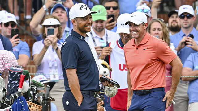 PINEHURST, NORTH CAROLINA - JUNE 13: Xander Schauffele and Rory McIlroy of Northern Ireland smile other on the first tee during the first round of the U.S. Open on the No. 2 Course at Pinehurst Resort on June 13, 2024, in Pinehurst, North Carolina.