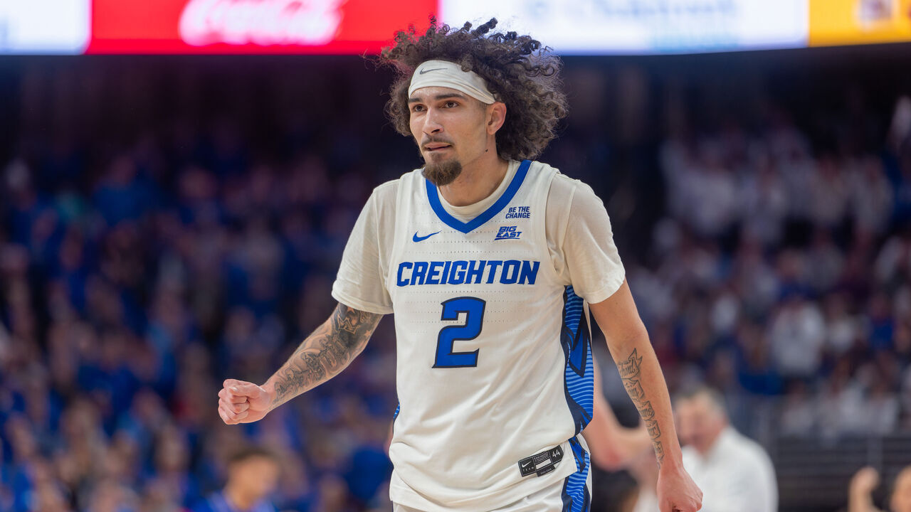 OMAHA, NE - DECEMBER 4: Creighton Bluejays guard Pop Isaacs (2) celebrates during the game against the Kansas Jayhawks on December 04, 2024, at CHI Health Center in Omaha, NE.