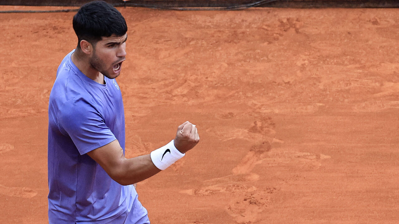 Spain's Carlos Alcaraz celebrates after winning against Argentina's Francisco Cerundolo during the Monte Carlo ATP Masters Series Tournament round of 32 tennis match on the Ranier III court at the Monte Carlo Country Club in Roquebrune-Cap-Martin on April 9, 2025.