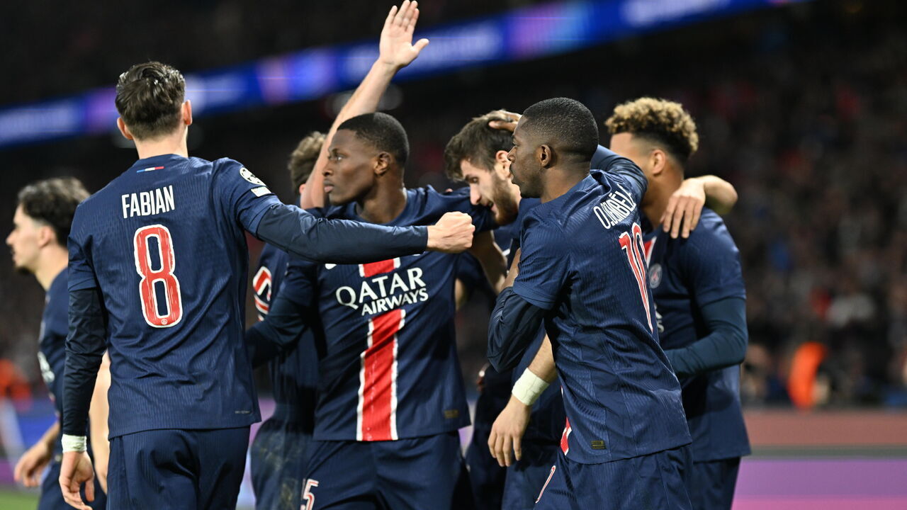 PARIS, FRANCE - APRIL 9: Khvicha Kvaratskhelia (7) of Paris Saint-Germain celebrates with teammates after scoring a goal during the UEFA Champions League Quarter-Final first leg football match between Paris Saint-Germain and Aston Villa at the Parc des Princes stadium in Paris, France on April 9, 2025.