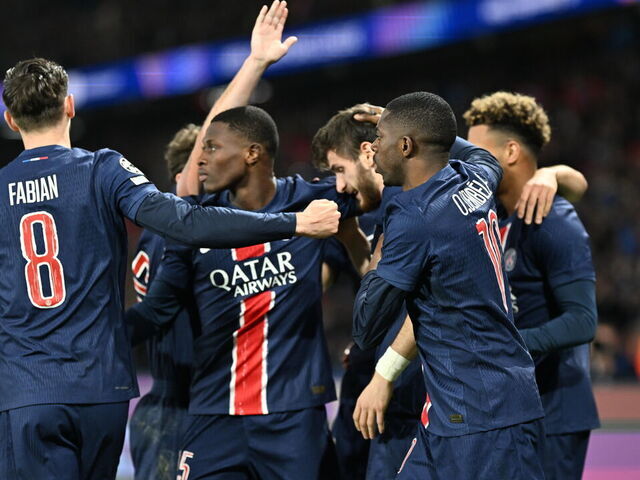 PARIS, FRANCE - APRIL 9: Khvicha Kvaratskhelia (7) of Paris Saint-Germain celebrates with teammates after scoring a goal during the UEFA Champions League Quarter-Final first leg football match between Paris Saint-Germain and Aston Villa at the Parc des Princes stadium in Paris, France on April 9, 2025.
