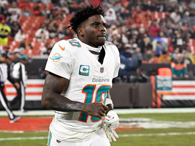 CLEVELAND, OHIO - DECEMBER 29: Tyreek Hill #10 of the Miami Dolphins runs onto the field at halftime against the Cleveland Browns at Huntington Bank Field on December 29, 2024 in Cleveland, Ohio.