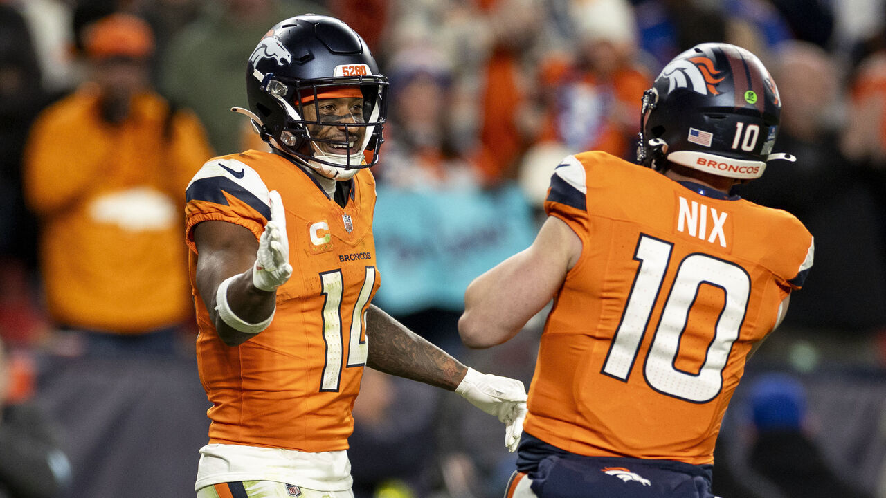 DENVER, COLORADO - DECEMBER 15: Courtland Sutton #14 of the Denver Broncos celebrates with Bo Nix #10 of the Denver Broncos during an NFL Football game against the Indianapolis Colts at Empower Field At Mile High on December 15, 2024 in Denver, Colorado.