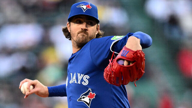 BOSTON, MASSACHUSETTS - APRIL 09: Kevin Gausman #34 of the Toronto Blue Jays pitches against the Boston Red Sox during the first inning at Fenway Park on April 09, 2025 in Boston, Massachusetts.