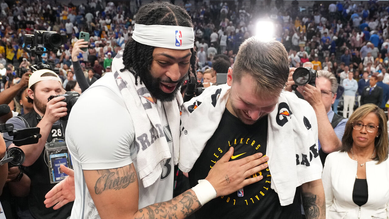 DALLAS, TX - APRIL 9: Anthony Davis #3 of the Dallas Mavericks and Luka Doncic #77 of the Los Angeles Lakers talk after the game between the Los Angeles Lakers and the Dallas Mavericks on April 9, 2025 at American Airlines Center in Dallas, Texas. Mandatory Copyright Notice: Copyright 2025 NBAE
