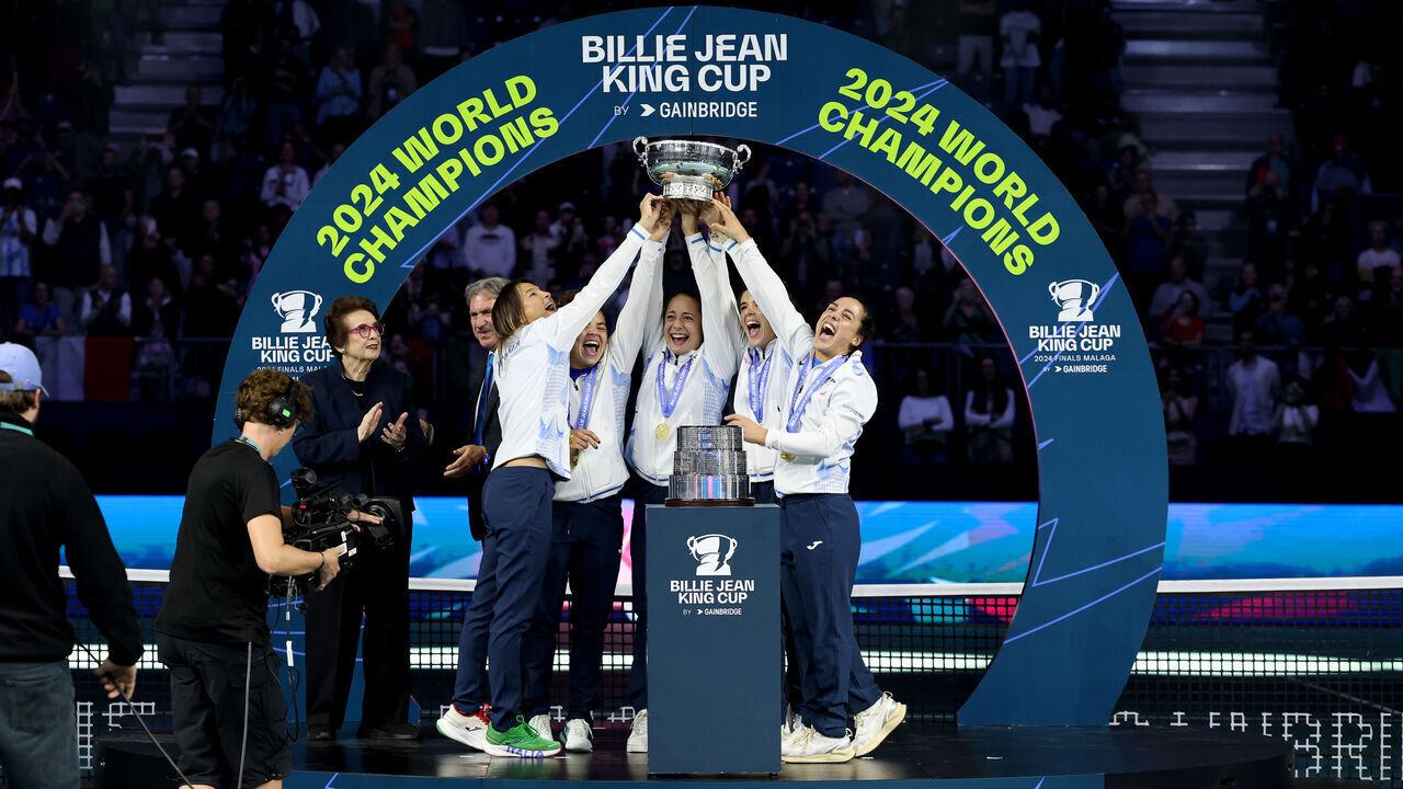 MALAGA, SPAIN - NOVEMBER 20: (L-R) Captain Tathiana Garbin, Elisabetta Cocciaretto, Jasmine Paolini, Lucia Bronzetti, Sara Errani and Martina Trevisan of Italy celebrate with the Billie Jean King Cup trophy after winning the Billie Jean King Cup Finals at Palacio de Deportes Jose Maria Martin Carpena on November 20, 2024 in Malaga, Spain.