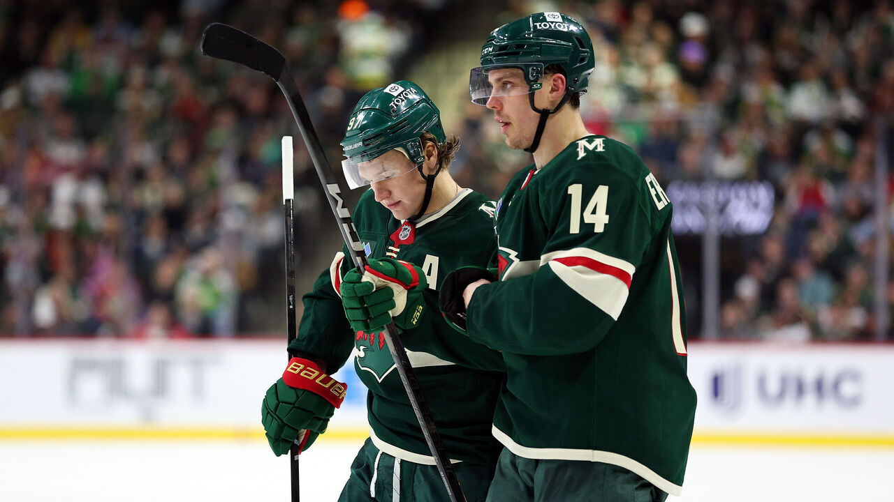 ST PAUL, MINNESOTA - APRIL 09: Kirill Kaprizov #97 and Joel Eriksson Ek #14 of the Minnesota Wild look on against the San Jose Sharks in the second period at Xcel Energy Center on April 09, 2025 in St Paul, Minnesota.
