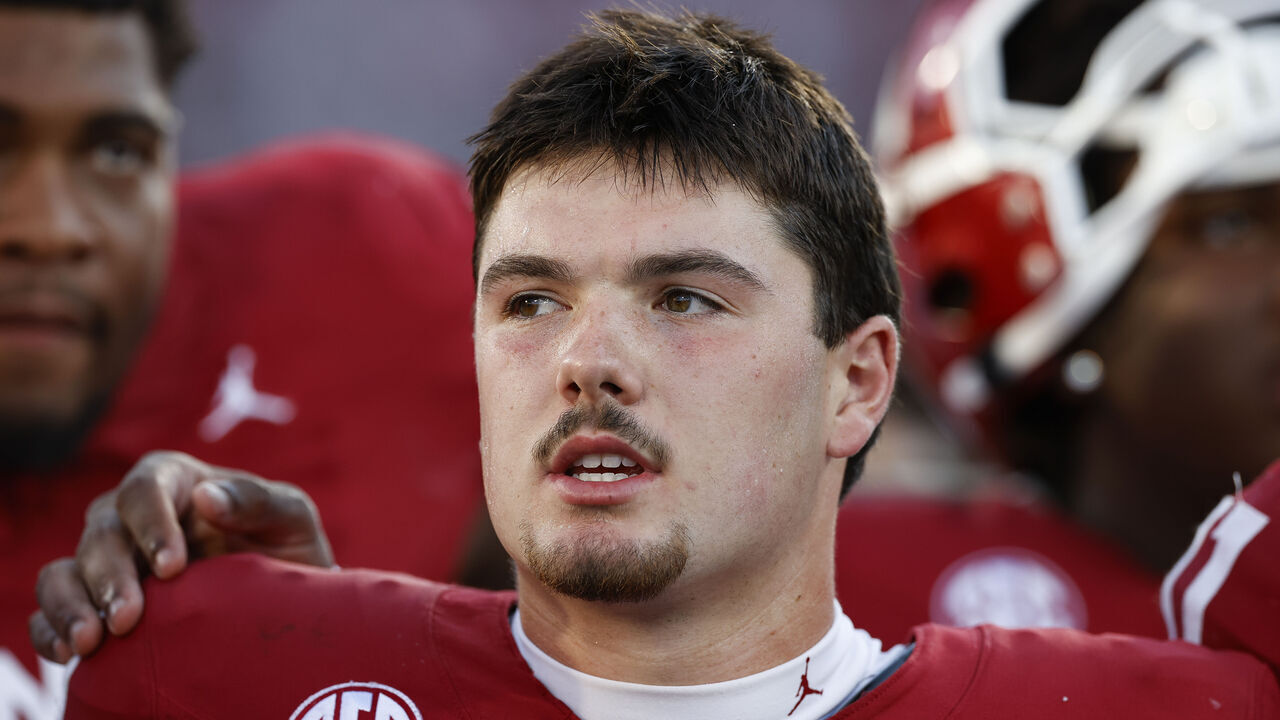 NORMAN, OKLAHOMA - SEPTEMBER 14: Jackson Arnold #11 of the Oklahoma Sooners with teammates following the game against the Tulane Green Wave at Gaylord Family Oklahoma Memorial Stadium on September 14, 2024 in Norman, Oklahoma.