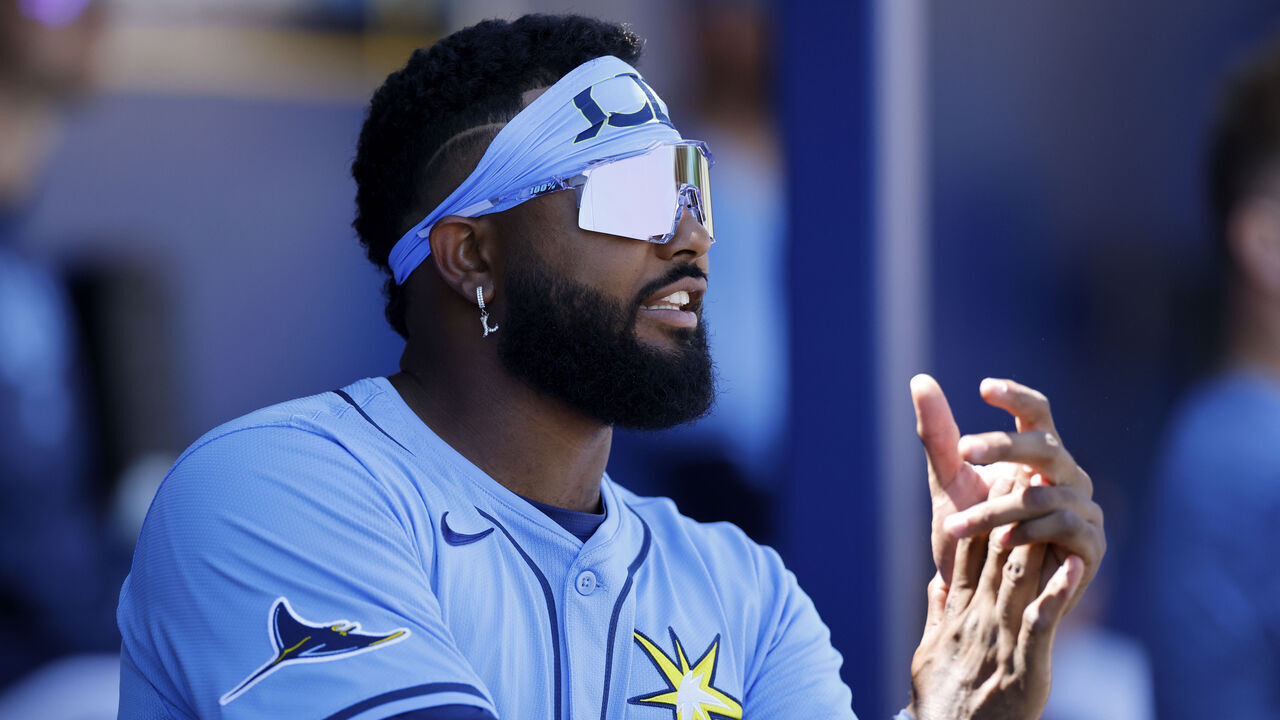 PORT CHARLOTTE, FL - MARCH 19: Tampa Bay Rays third baseman Junior Caminero (13) reacts from the dugout during an MLB Spring Training baseball game against the Pittsburgh Pirates on March 19, 2025 at Charlotte Sports Park in Port Charlotte, Florida.