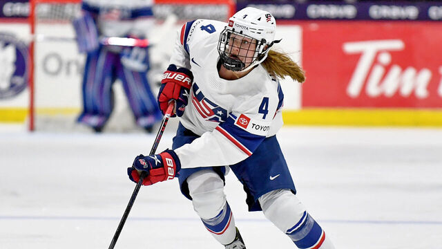 UTICA, NEW YORK - APRIL 05: Caroline Harvey #4 of United States cuts to the middle shortly after making cross ice pass in first period against Czechia during the 2024 IIHF Women's World Championship at Adirondack Bank Center on April 05, 2024 in Utica, New York.
